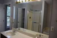 Main Bath with Walk In Shower and Jetted Tub