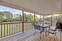 A covered deck gives extra space to relax and view the beautiful surroundings