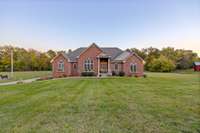 Welcome to your dream retreat. A stunning home nestled on 5.99 acres of land, containing approximately 3800 feet of living space with so many uses .