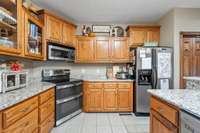 The kitchen has lots of drawer space and a double oven