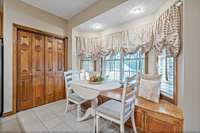 The alcove or breakfast area and the pantry
