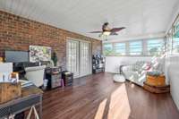 Just off the Primary Bedroom, a built in sunroom resides.