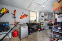 Workshop space is located just off the garage