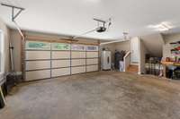 Oversized two car garage with room for a work bench.