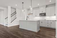 To Be Built Listing. Home has not started construction and waiting for someone to purchase this lot and build a new home like this Kinsley! Photos are from another completed Kinsley for visualization.