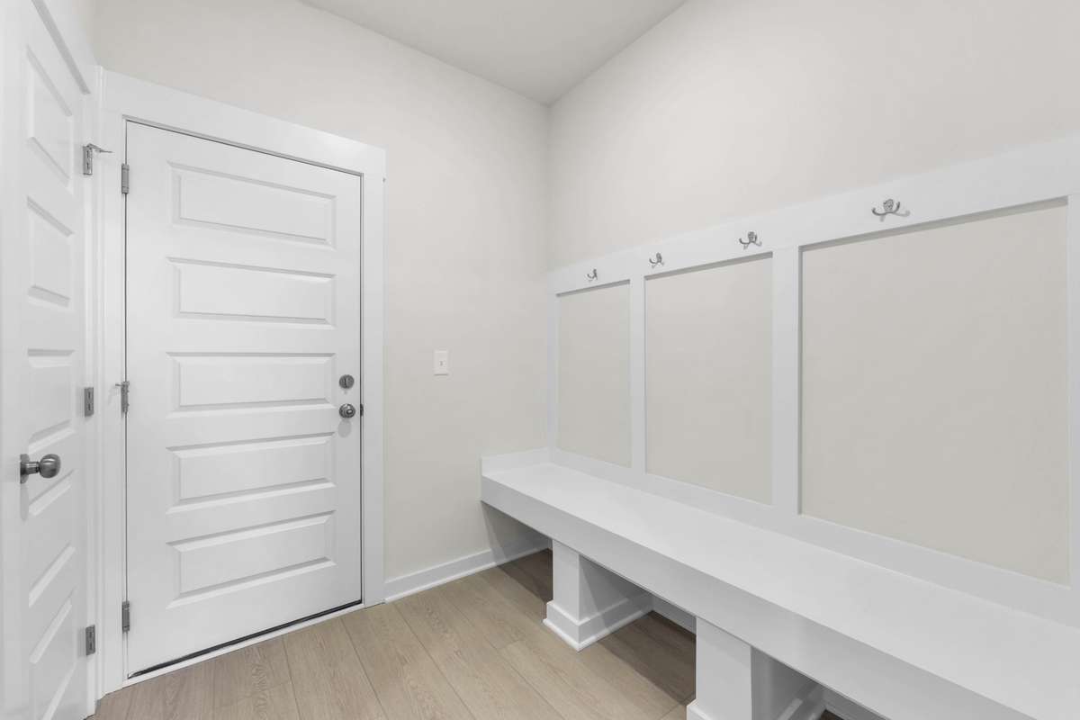 Drop zone right off large 3 car garage