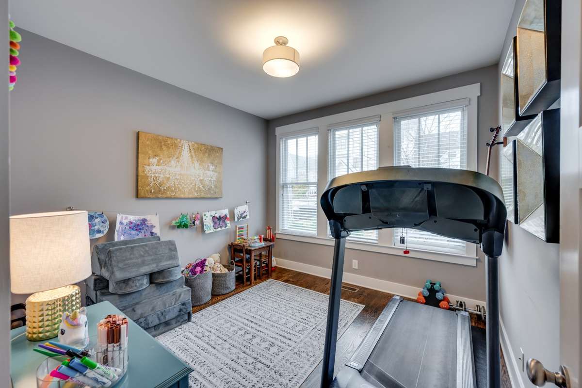 First level Bedroom currently exercise/ play room.