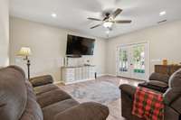 Large family room/great room with high ceilings and lots of natural light.