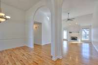 Dining room opens to great room with fireplace