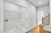 Bedroom Level Provides the Laundry Room on the Same Floor

Note: Photo is of a model home in a different community. Specifications & Design May Vary.  See Sales Consultant for more details.