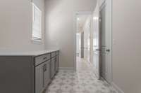 Huge laundry room with window for extra lighting