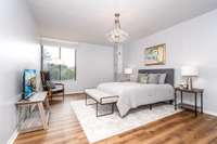 Large primary bedroom with full bath.