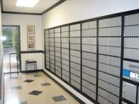 Mail room.  Packages are held secured by doorman until picked up.  Doorman will call or there will be a text informing package received