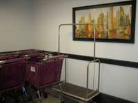 Carts available for packages, groceries, luggage etc.  Doorman will assist if needed for unloading. Cameras on sight show the front desk concierge when someone pulls up to the side door to unload.