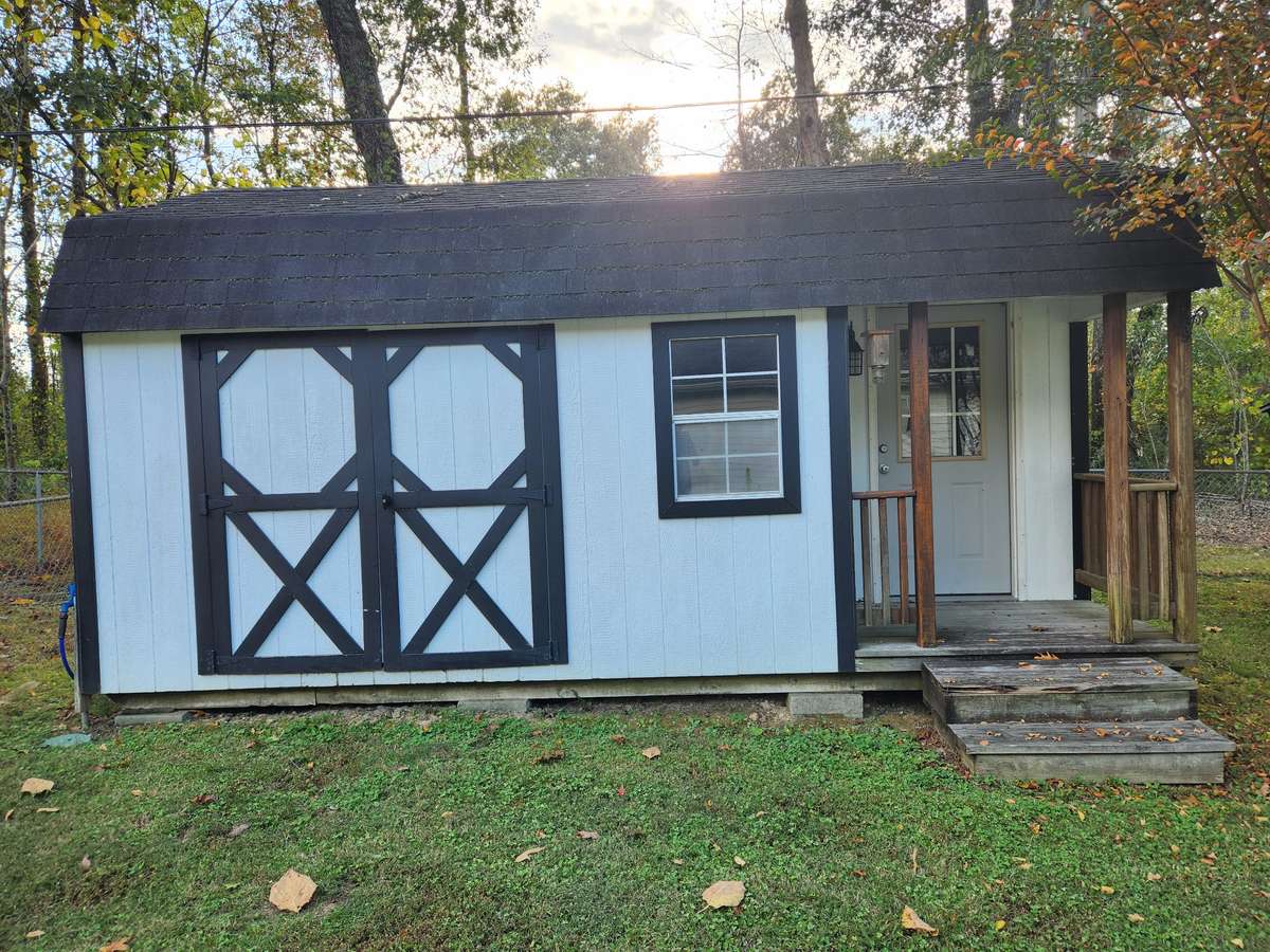Approximately a 20x12 storage shed