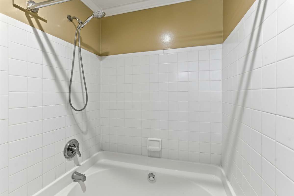 Garden tub and shower in primary bedroom
