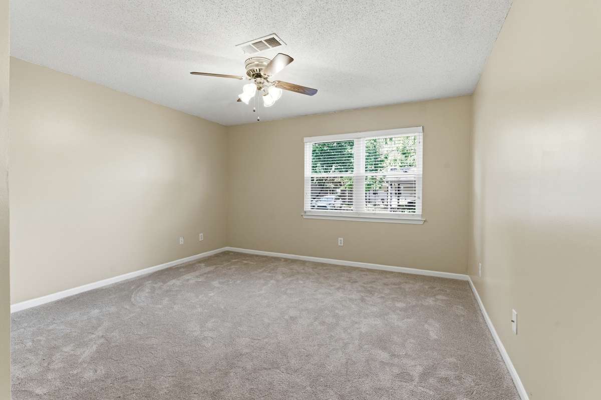 The third bedroom is very large and has plenty of natural light.