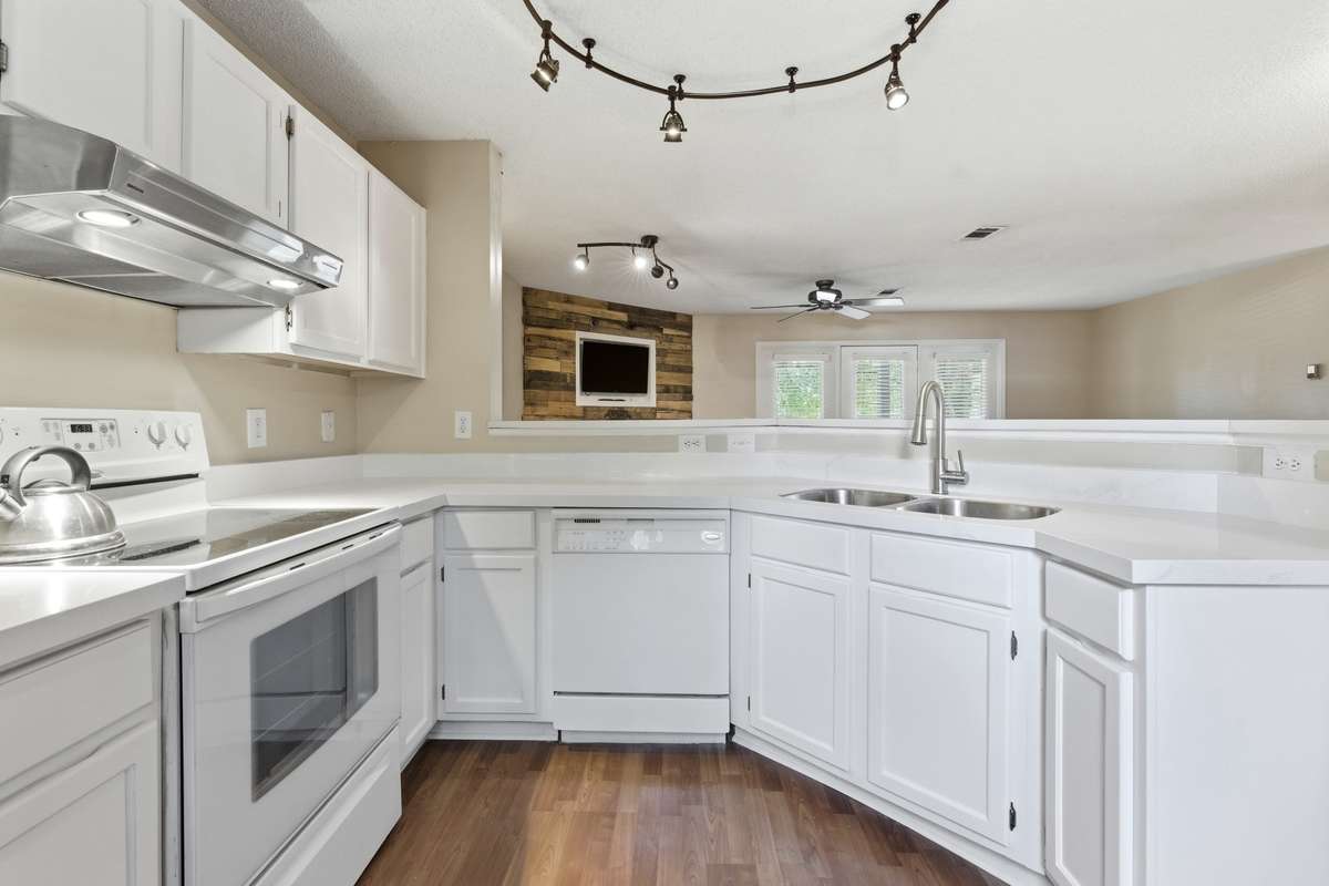 The Kitchen is the gathering place for many homeowners and an open concept to living and dining is a must!  Check!