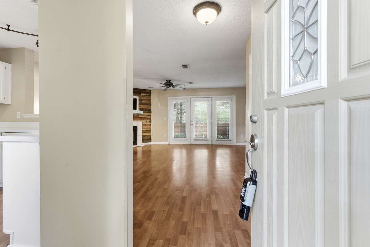 Welcome to your next home! Let's step inside this freshly renovated condo with a wonderful backyard and covered patio green space.