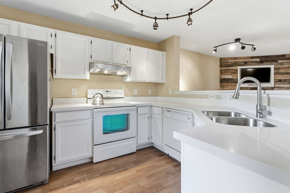 New Kitchen countertops are light and bright and look at all that space!