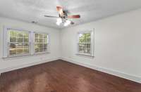 Just beyond the bathroom is the primary bedroom! This room is the perfect size to include a sitting area in your bedroom, or for a bedroom/office combo!