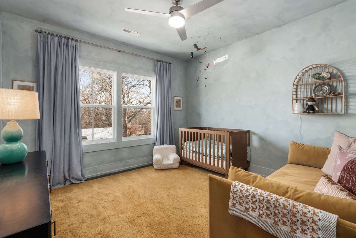 Soft light, gentle tones, and room to grow—this peaceful nursery offers a warm, nurturing space for life’s earliest moments.