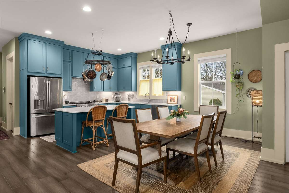 Kitchen and dining flow effortlessly—ideal for morning coffee at the island, casual lunches, and evenings spent over dinner.