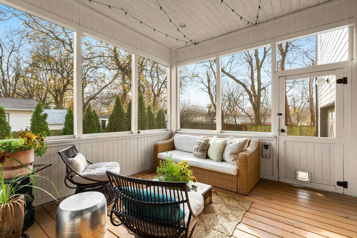 A screened-in porch made for open windows and fresh air—ideal for morning coffee, afternoon breezes, and evenings spent outdoors without leaving home.
