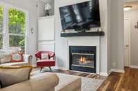 Enjoy the view from your main floor kitchen, dining and living space in front of your own fireplace