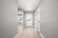 Another look at the front foyer. Here you see the location of the two spare bedrooms.