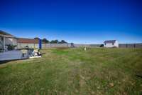 Back Yard- privacy fenced, nice level yard, 11x16 outbuilding