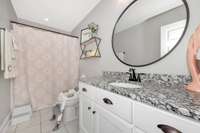 Full Bath- tile flooring, tub/shower combo