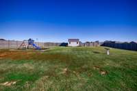 Back Yard- privacy fenced, nice level yard, 11x16 outbuilding