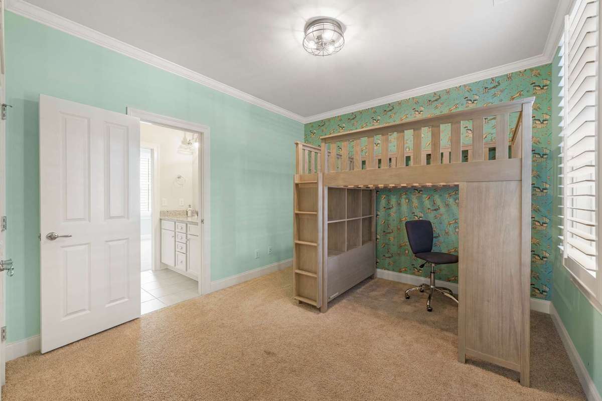 bedroom #2 upstairs shares a bath with bedroom #3.  All three bedrooms have generous closets and custom wall coverings. Children's bunk available for separate sale