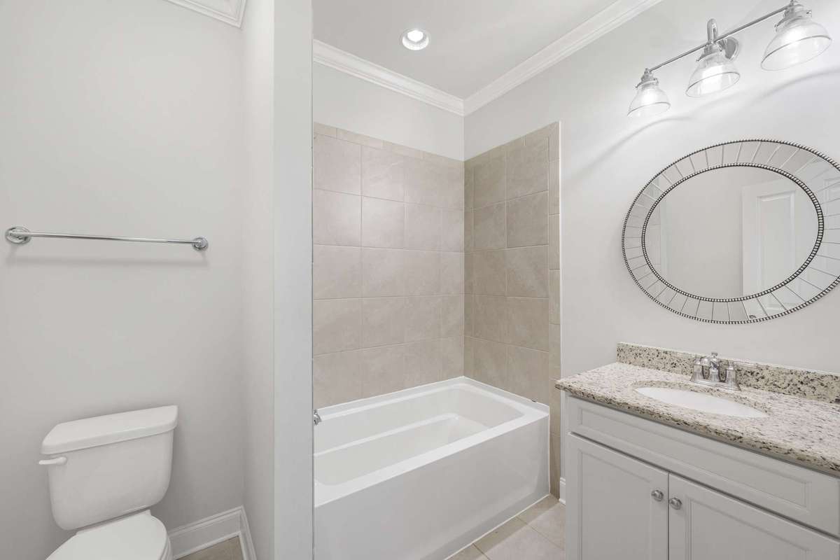 third full bath, located upstairs off hallway near bedroom #4.