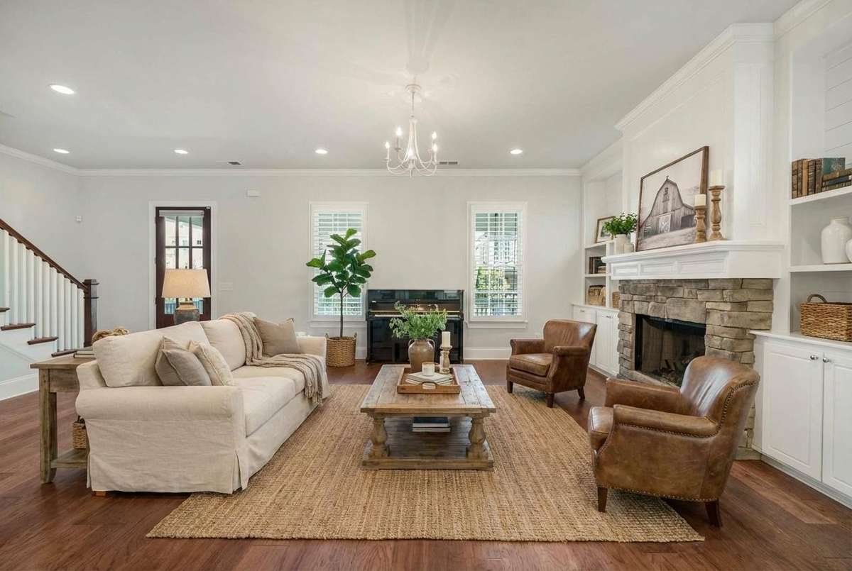A virtually staged photos representing seating options in the main floor living room!