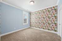 Bedroom #3 with direct access to bath and custom color and wall covering.