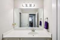 Guest bathroom features an oversized single vanity and combo tub and shower.  2263 Cason Ln Murfreesboro TN 37128