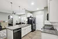 Your kitchen has features granite countertops, & subway tile backsplash.  2263 Cason Ln Murfreesboro TN 37128