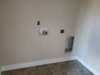 Separate Laundry Room is located off of the Kitchen.  Picture of Similar House.