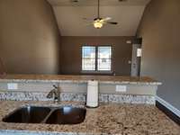 Granite Countertop and Bar Top in Kitchen. Picture of Similar House.