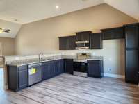 Kitchen will have Dark Brown Custom Cabinets with Cabinet Pantry,
  Picture of Previous House.