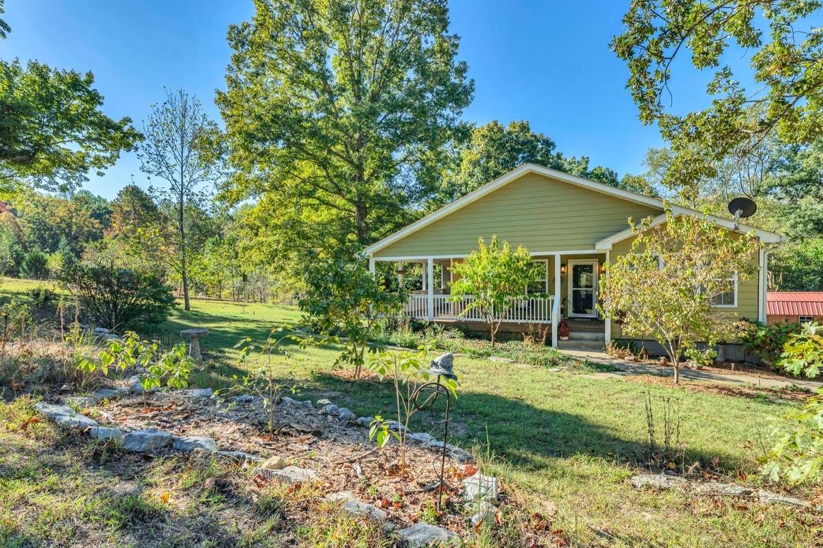 The seller has planted lots of landscaping in the front yard.