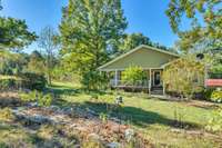 The seller has planted lots of landscaping in the front yard.
