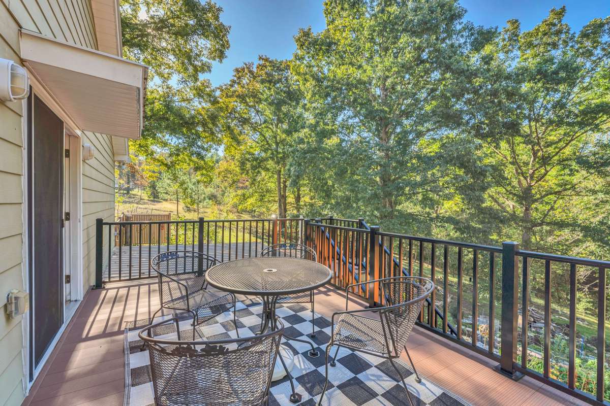 Picture yourself on this deck off the primary bedroom suite watching the gorgeous Middle TN sunsets.