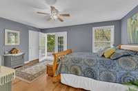 The door on the left is a second closet. French doors give you access to the rear yard and make life so much easier.