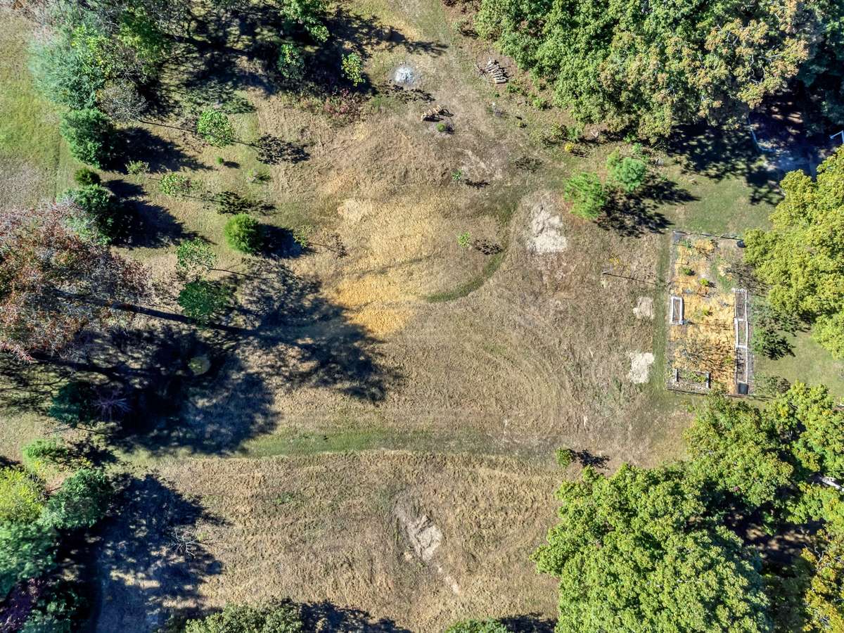 This is the additional acreage for sale.  You can see the dog run on the right side of this photo.