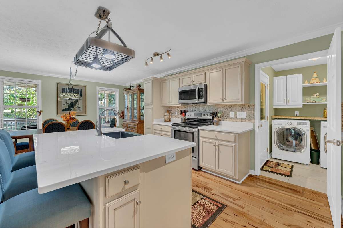 Notice the laundry room right off the kitchen.  There is additional storage space here.