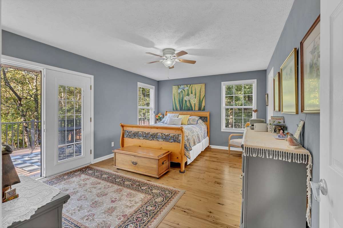 The primary bedroom is tucked away in the back corner of the home.