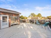 This spacious deck gives you ample spaces for entertaining.